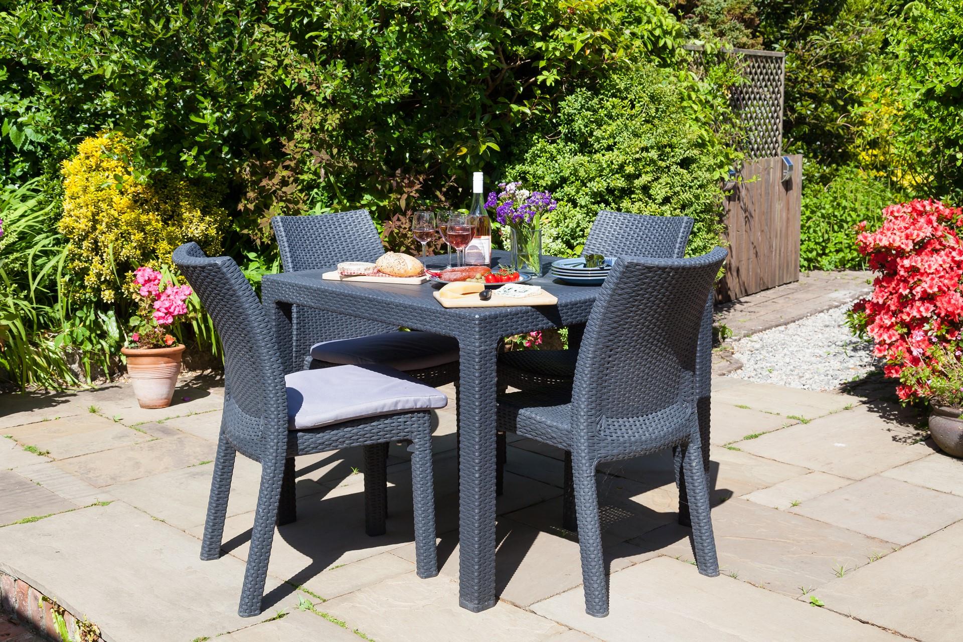 Enjoy your meals al fresco in the sun trap garden.