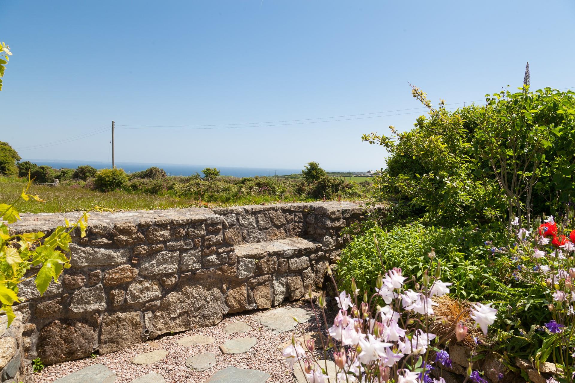 Take your morning cuppa out to the garden to take in the views.