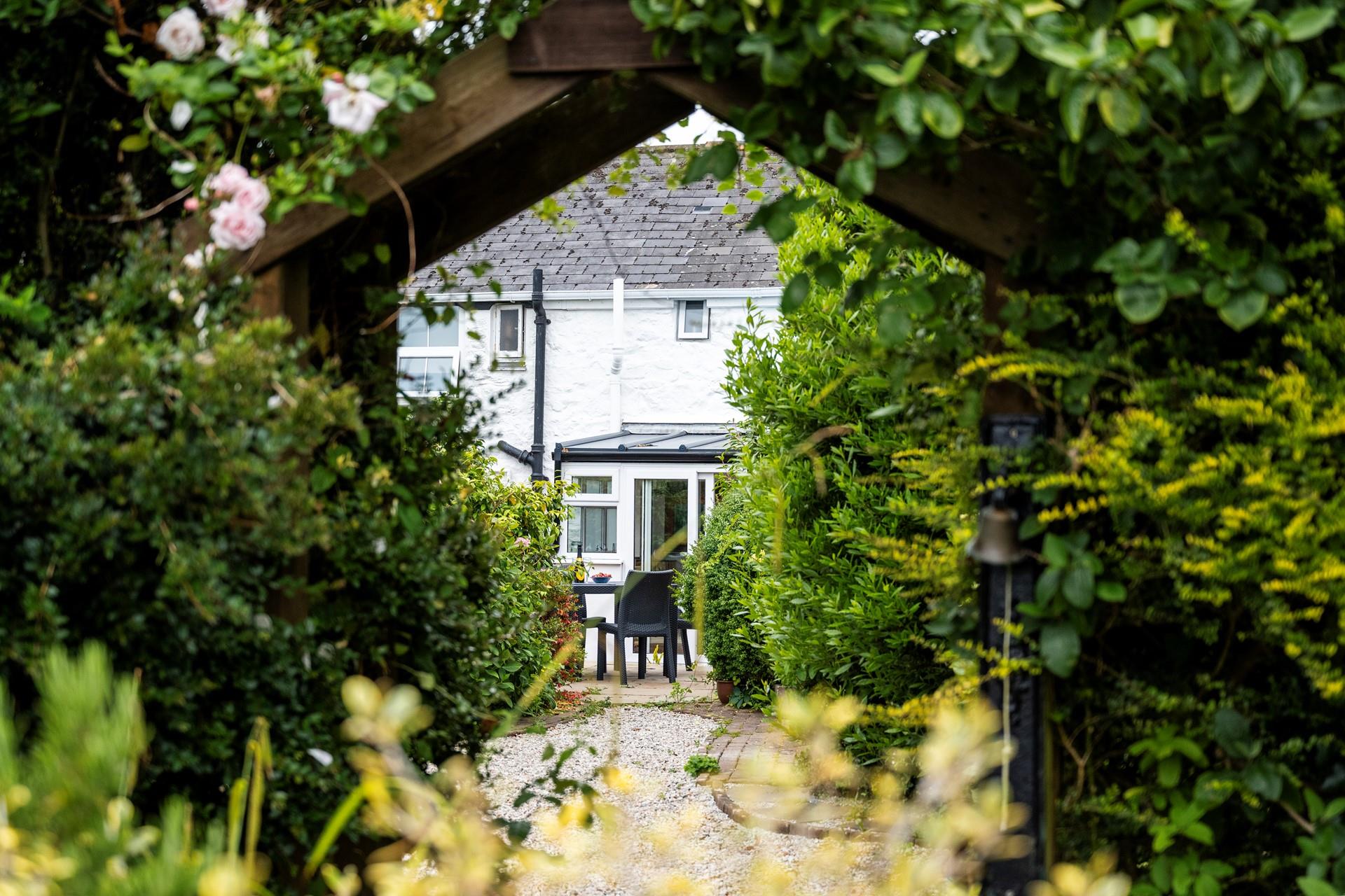 Sink into relaxation mode in the leafy green garden.