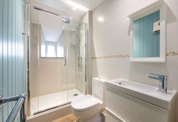 The double bedroom has an en-suite with a large enclosed shower, WC and basin. 