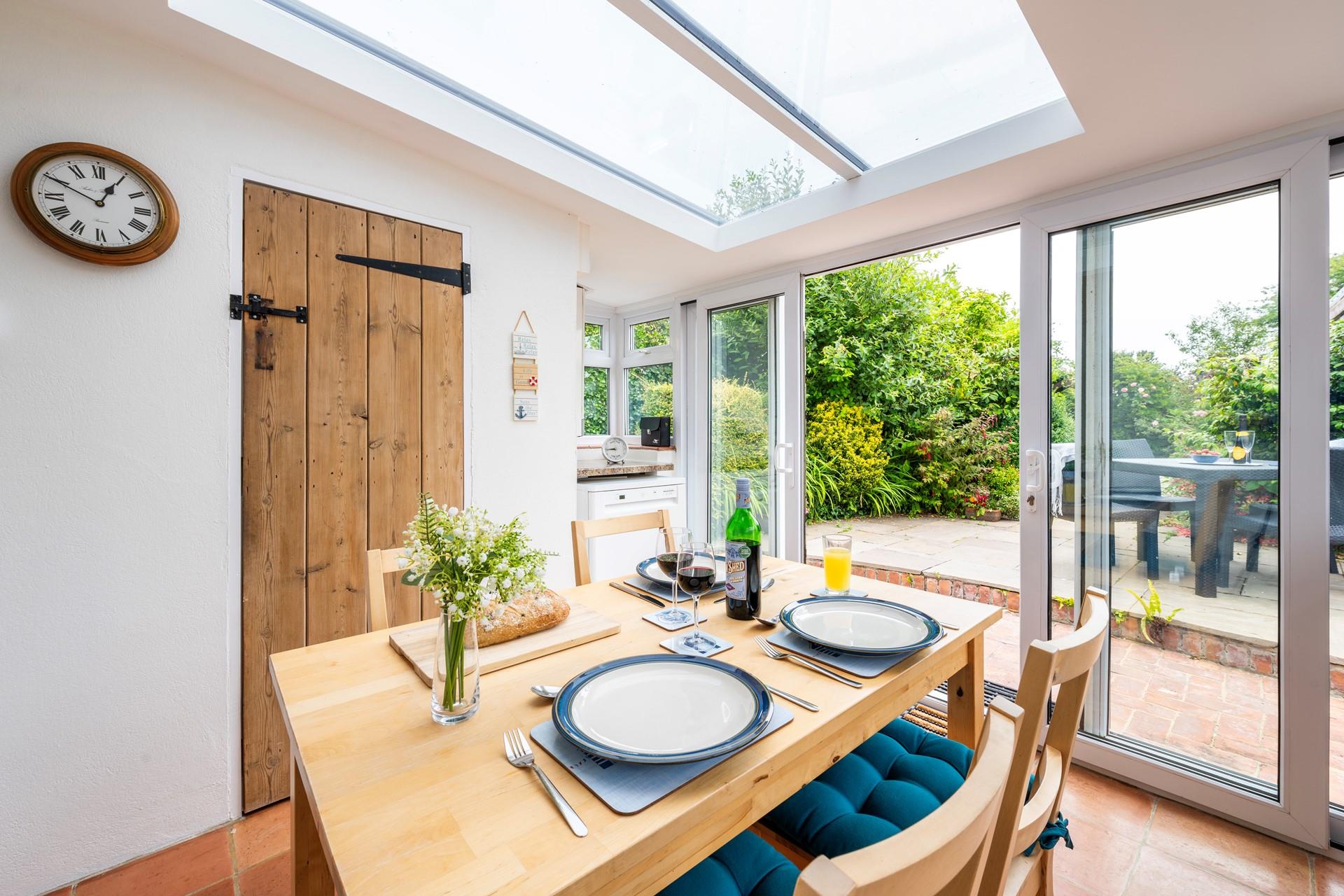 Treat yourself to a Cornish cream tea with the sunshine filling the dining room.