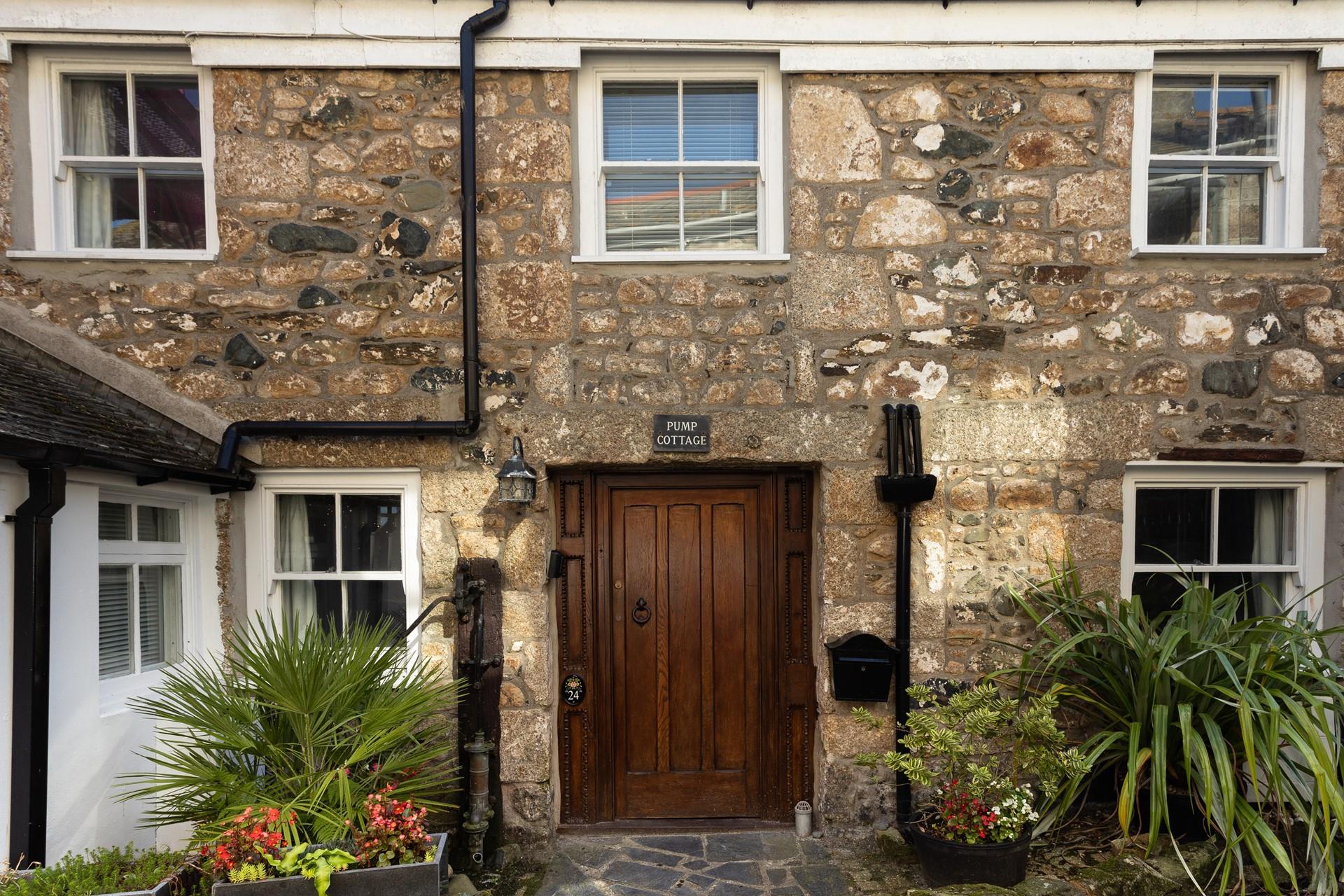 This atmospheric cottage looks as though it has been pulled straight out of a fairytale.
