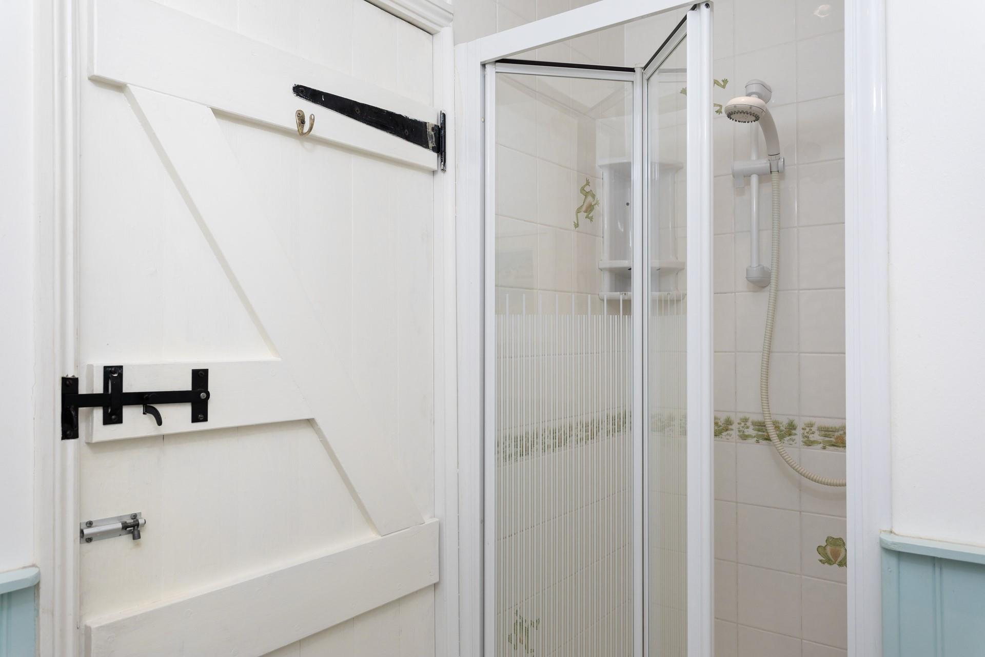 At the end of a fun-filled day on the beach, wash away the sand but not the memories.