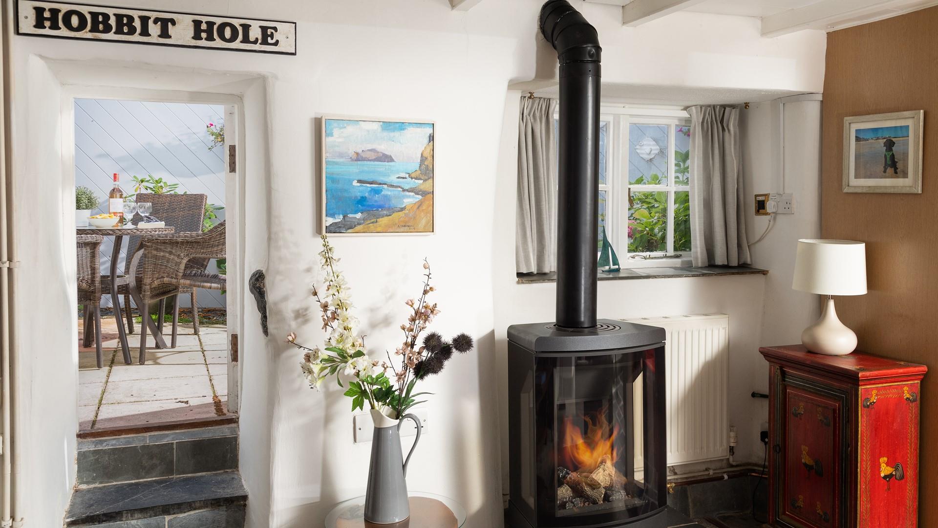 We love the creative 'hobbit door' that leads onto the secluded and enclosed outside area.