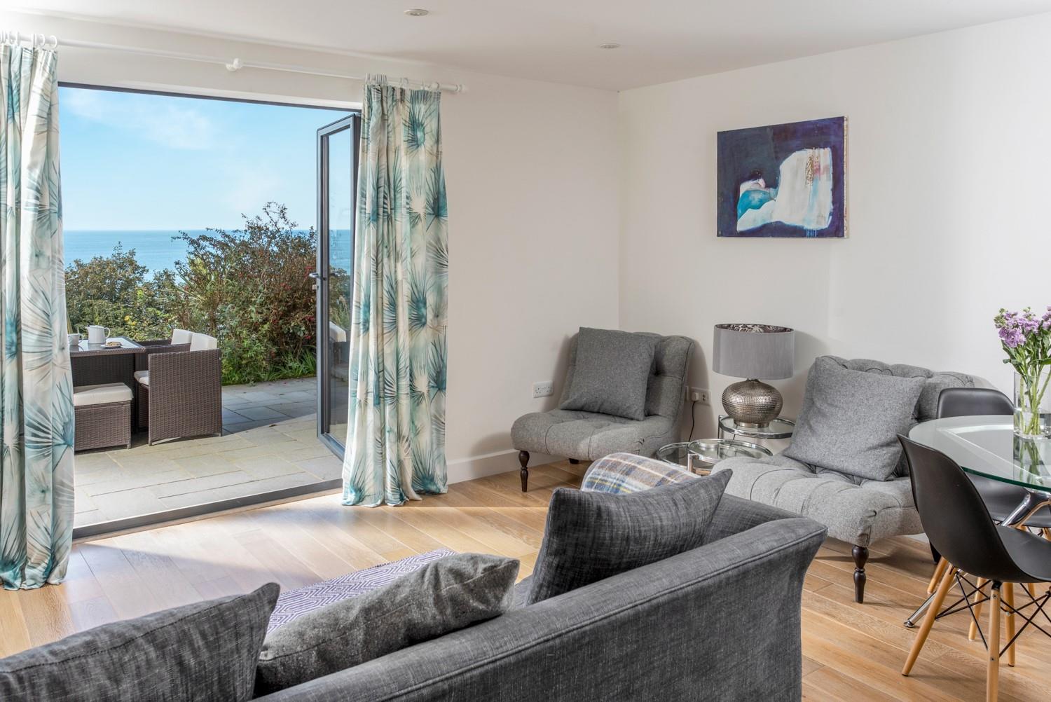 Relax and watch the waves from the comfort of the sofa or patio.