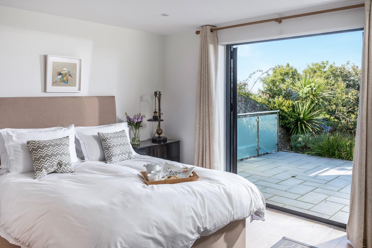 Wander out onto the patio when you wake up and take in the fresh sea air and stunning views.