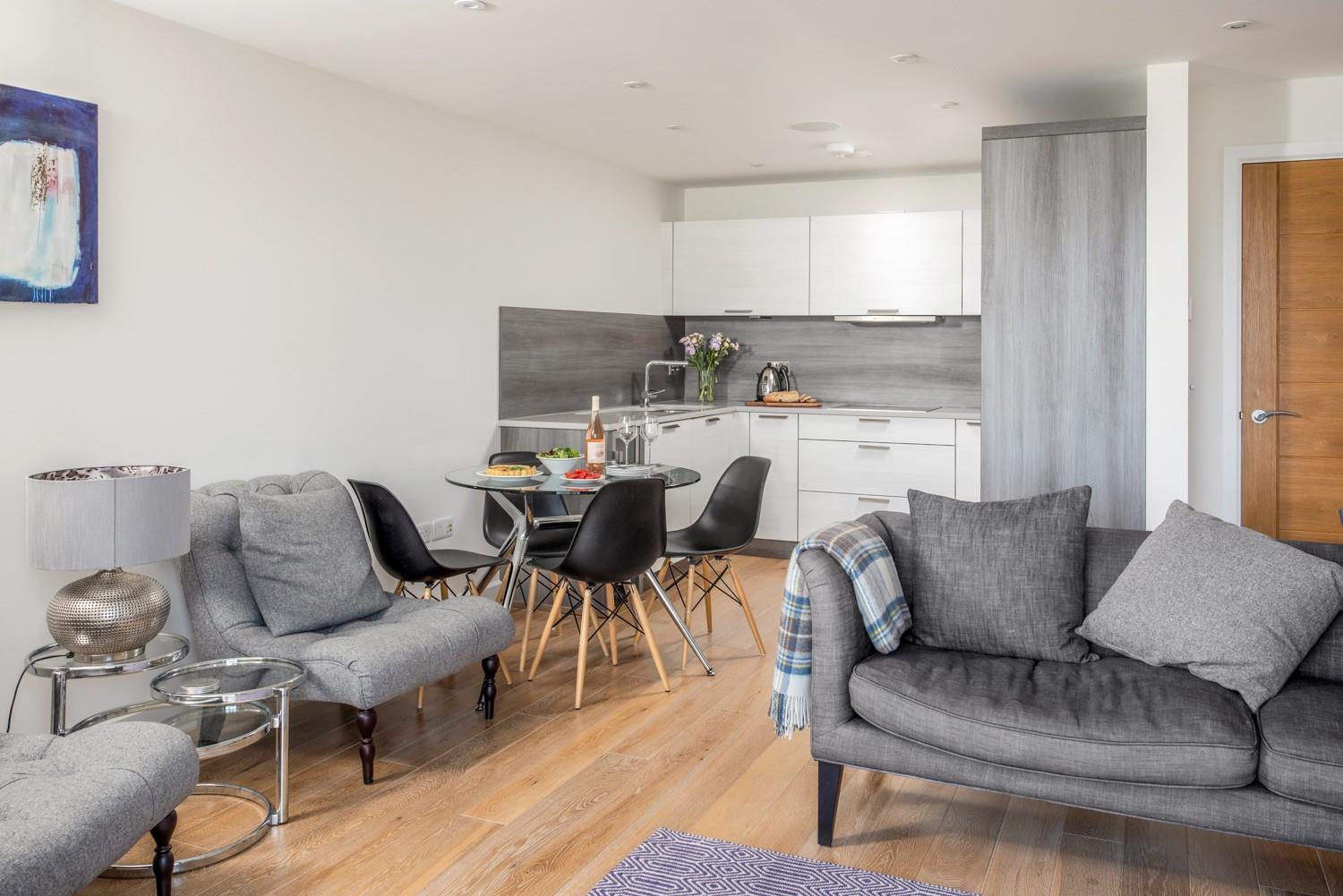 Relax, cook, and dine together in the living area.