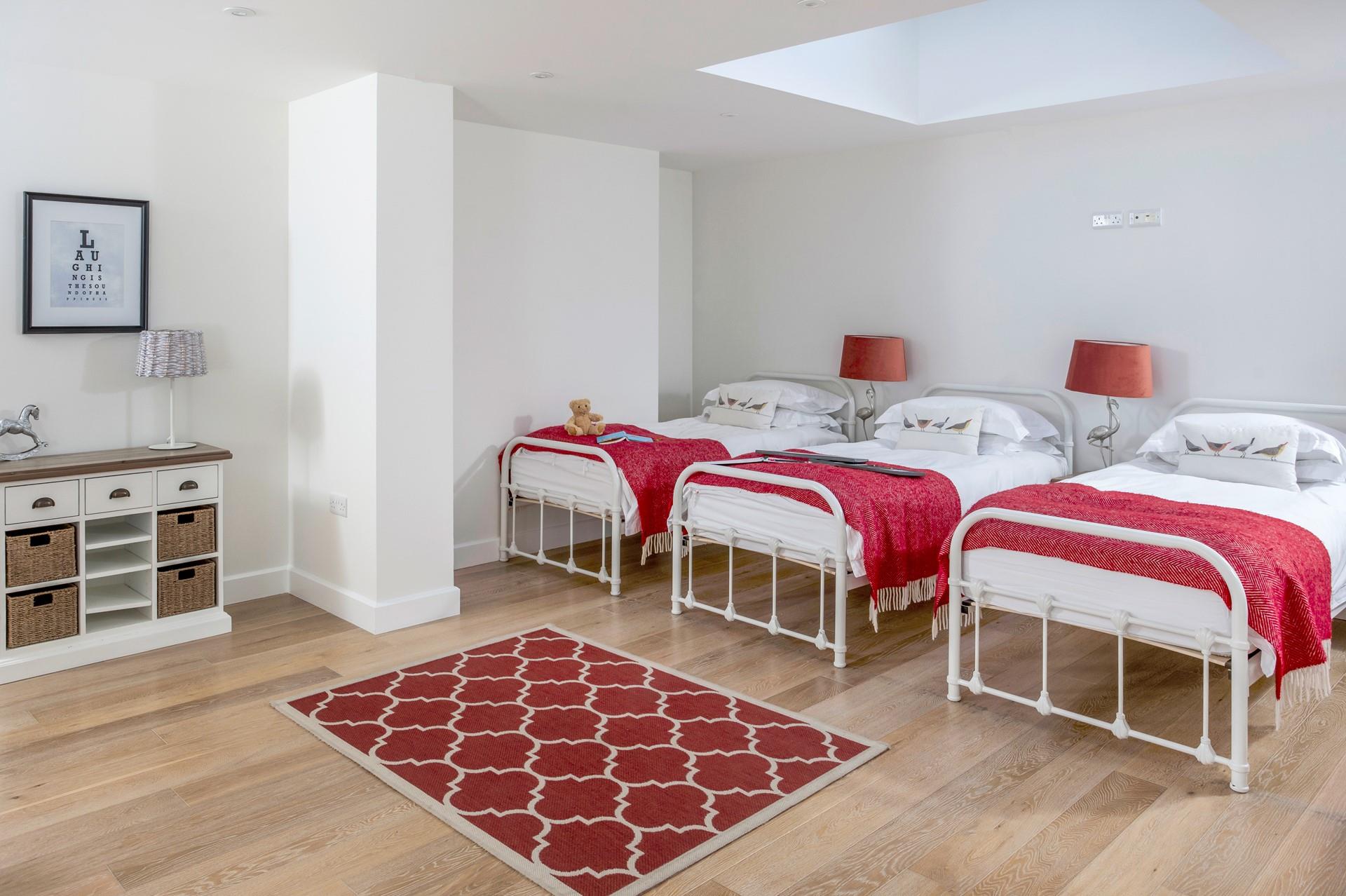 Bedroom 2 is spacious and can fit 4 people comfortably.