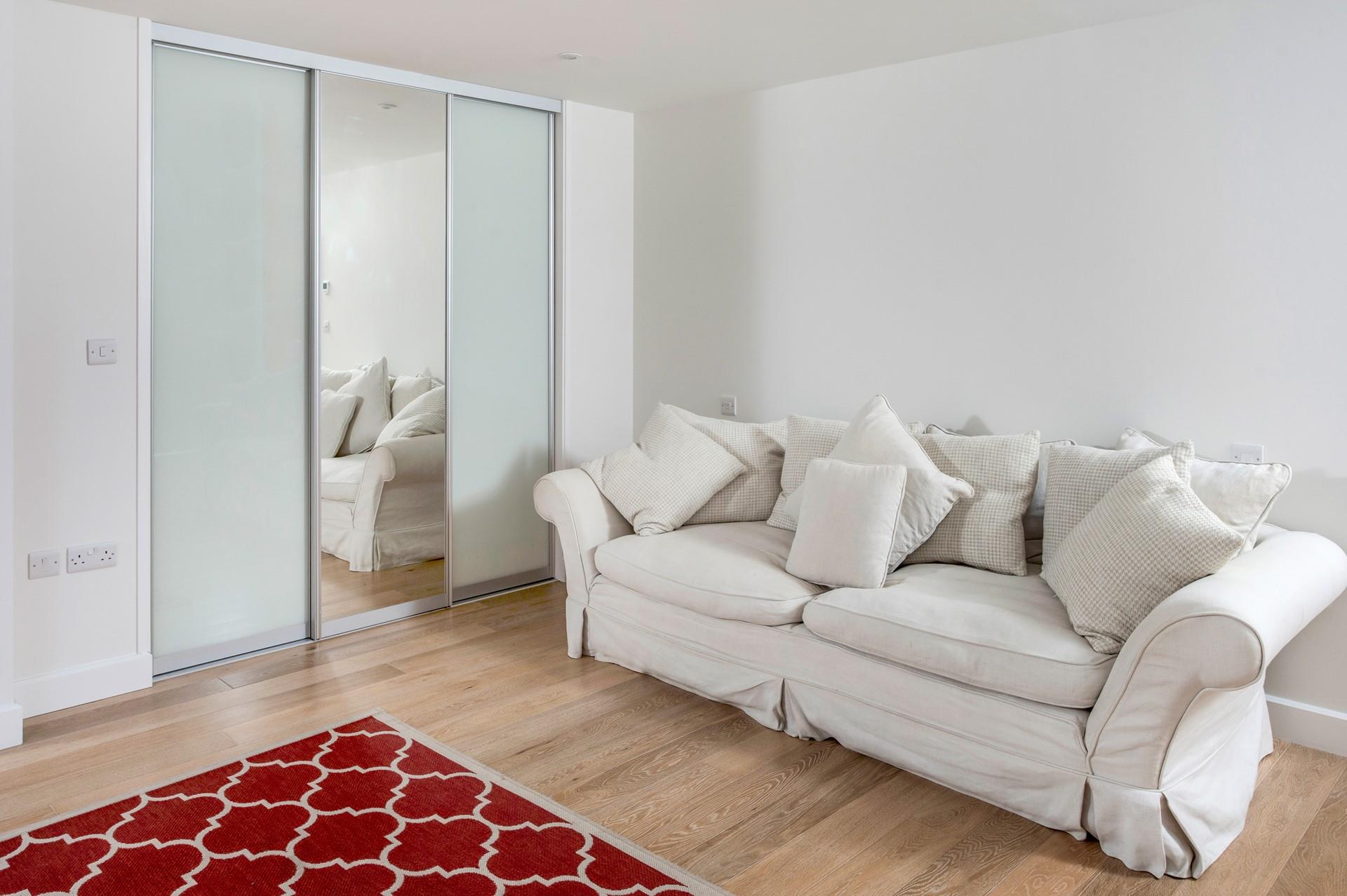 Bedroom 2 also has a sofa and provides additional space to relax.