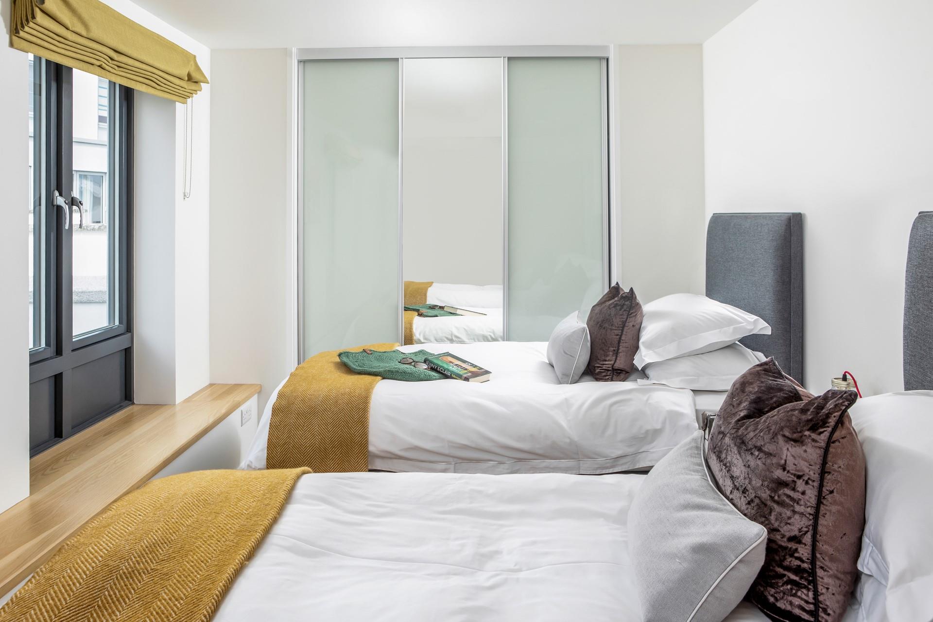 Tuck into the cosy beds after a memorable day spent on the beach.