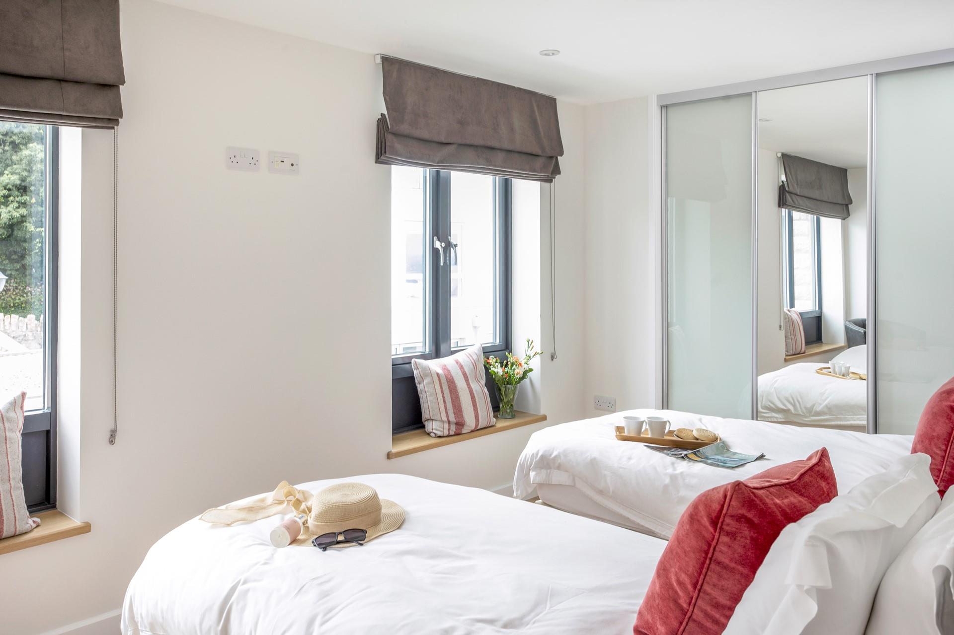 Spend mornings in bed ahead of a fun-filled day on the coast.