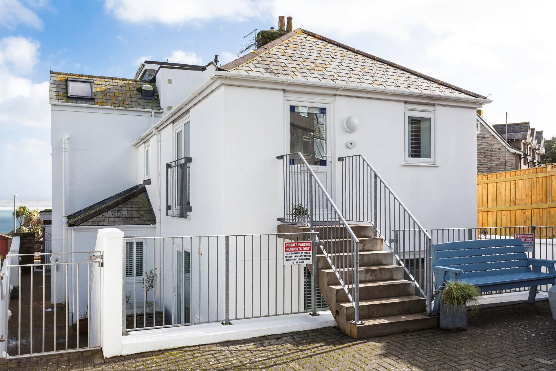 Take a quiet moment to yourself on the outside bench.
