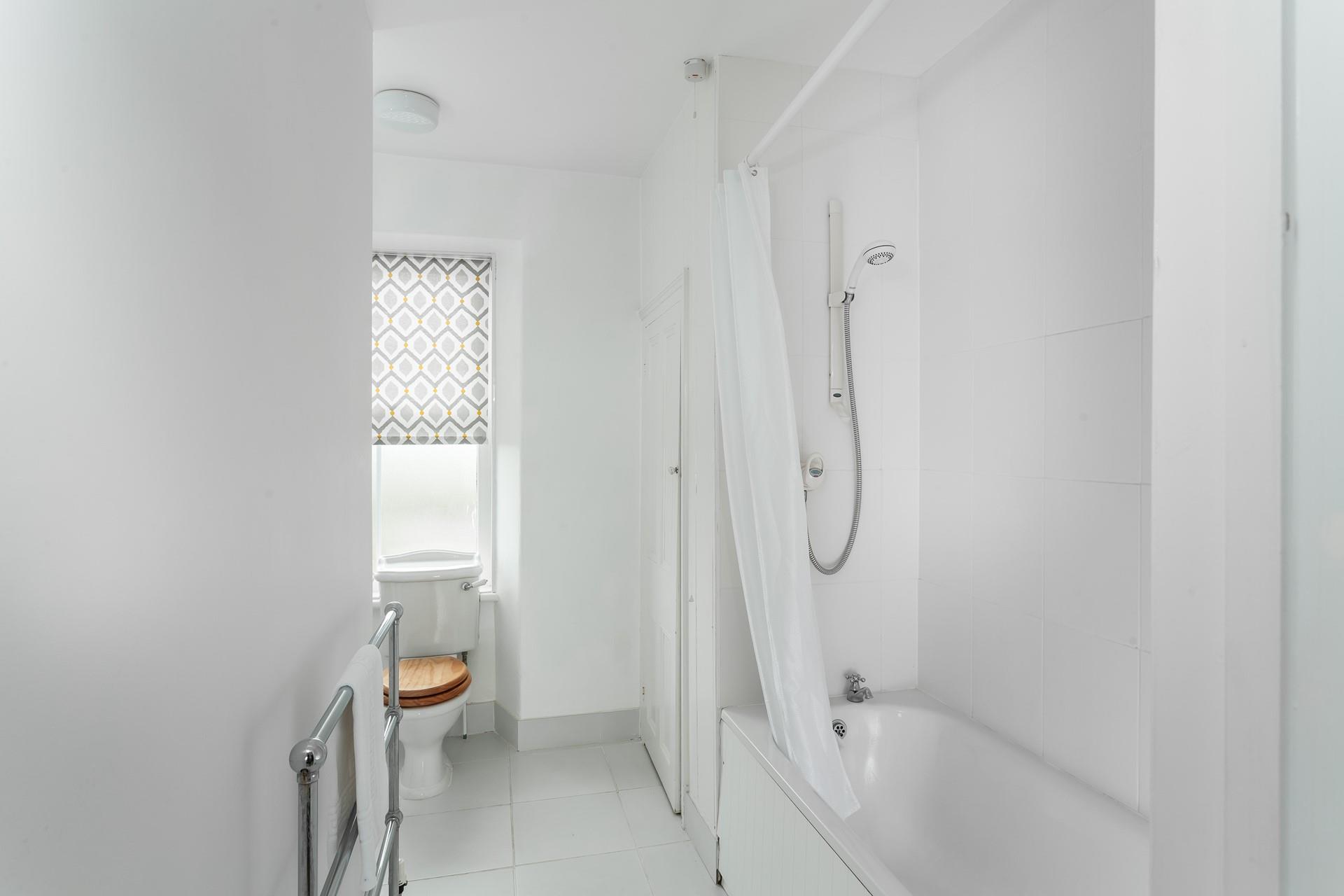 Wash off the sand from a day on the beach in the bathroom.