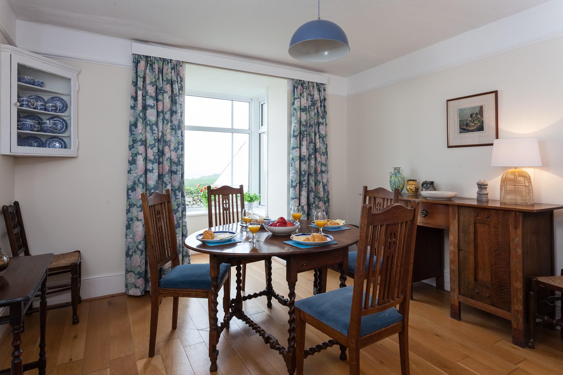 Indulge in a tasty breakfast around the dining table.