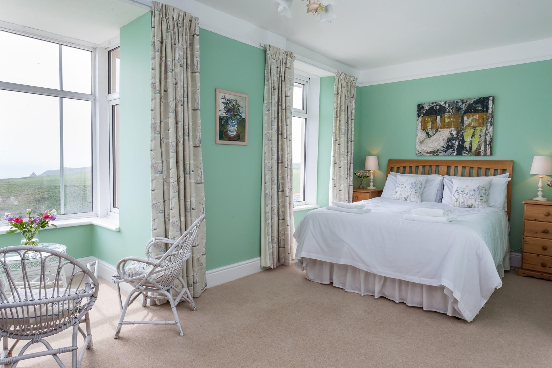 The 1st bedroom has a king size bed, an en suite shower room and stunning views.