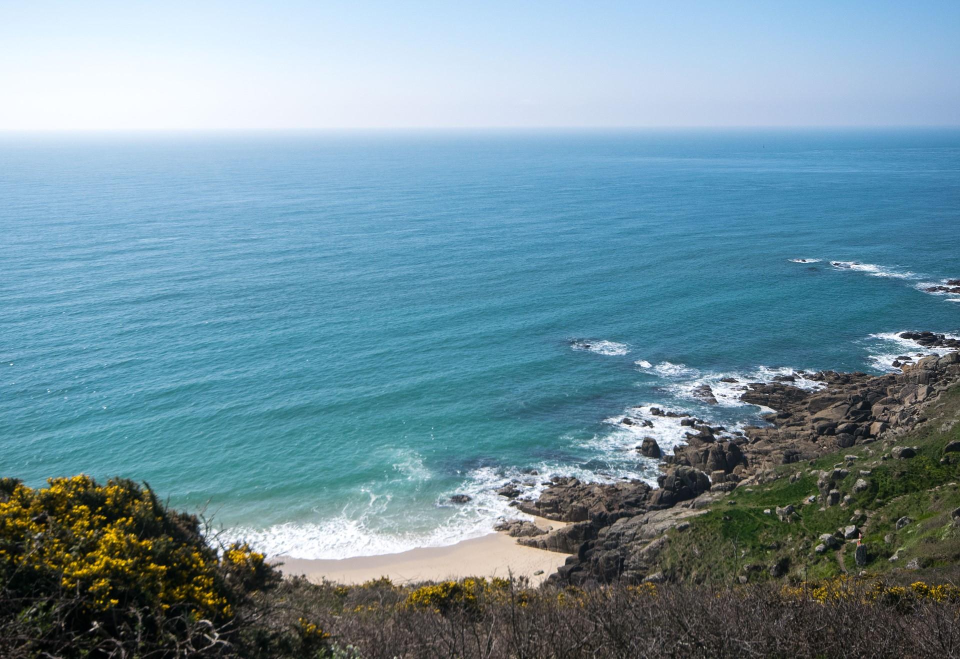 Spend the day sunbathing on the beautiful sands of Porthcurno beach.