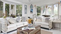 Bring a glass of wine and a book and relax in the summerhouse. 