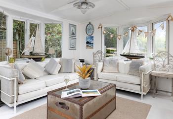Bring a glass of wine and a book and relax in the summerhouse. 