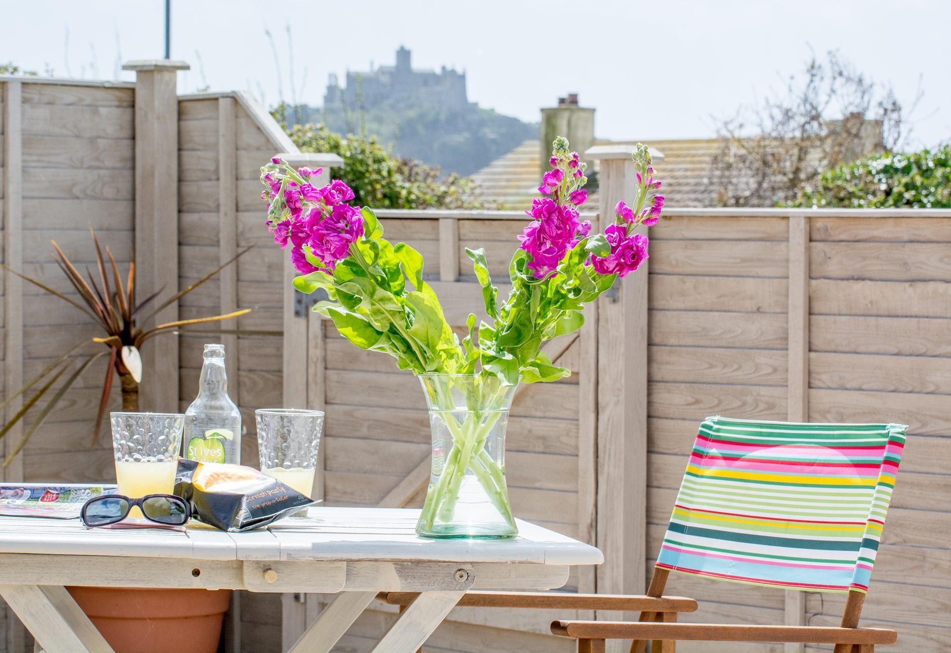 Enjoy a cool drink and get stuck into a good book on a sunny evening.