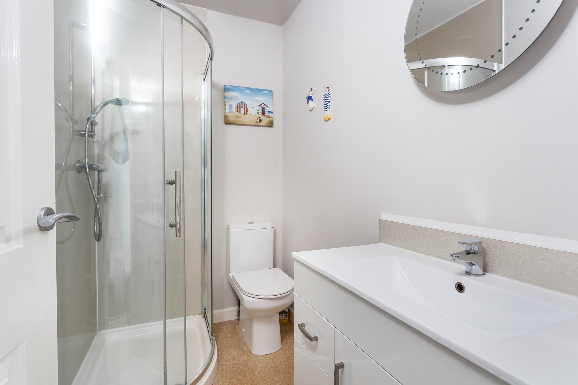 Wash off your sandy toes in the shower after a day on the beach.