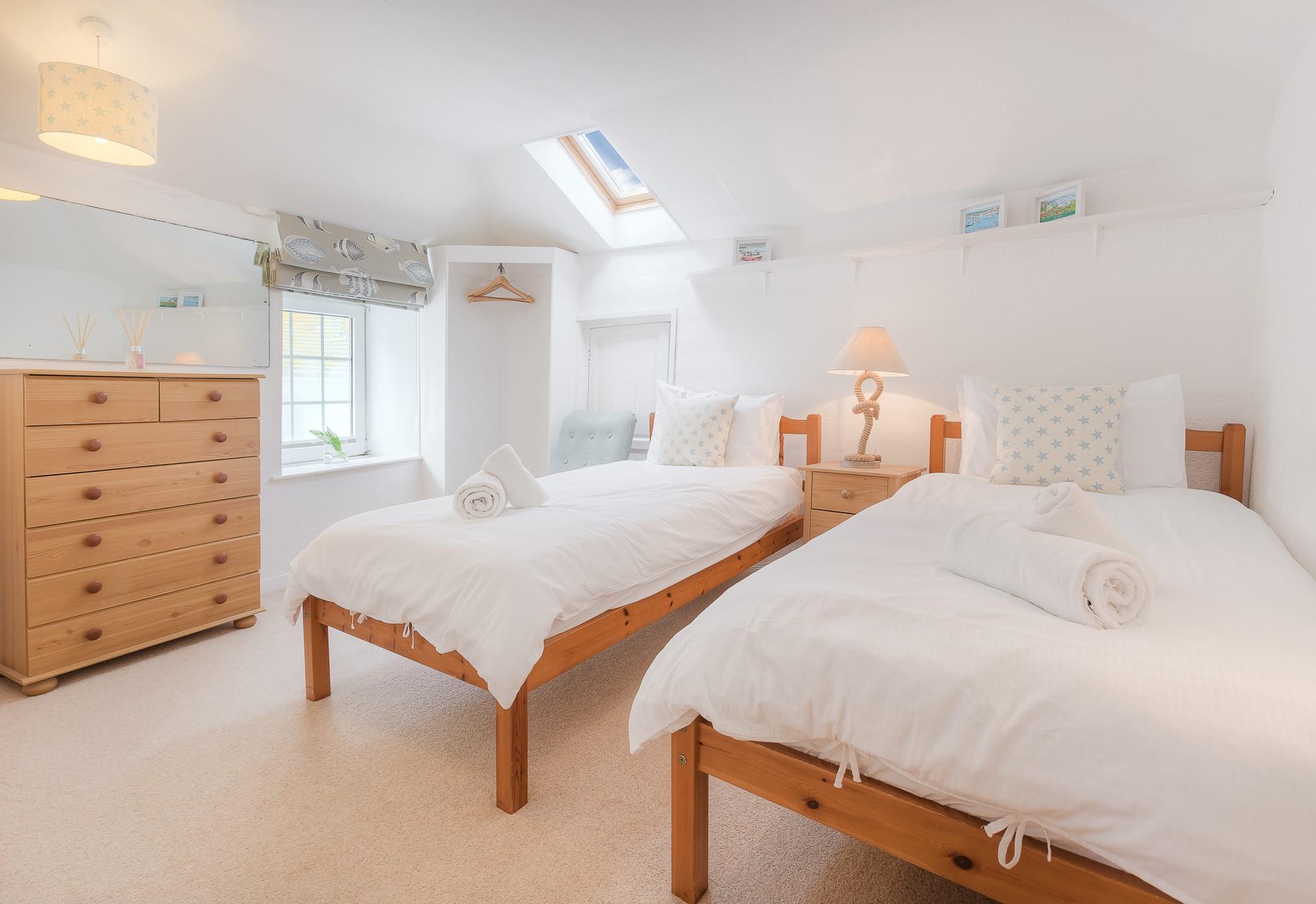 Bedroom 2 is filled with light and is the perfect space to relax.