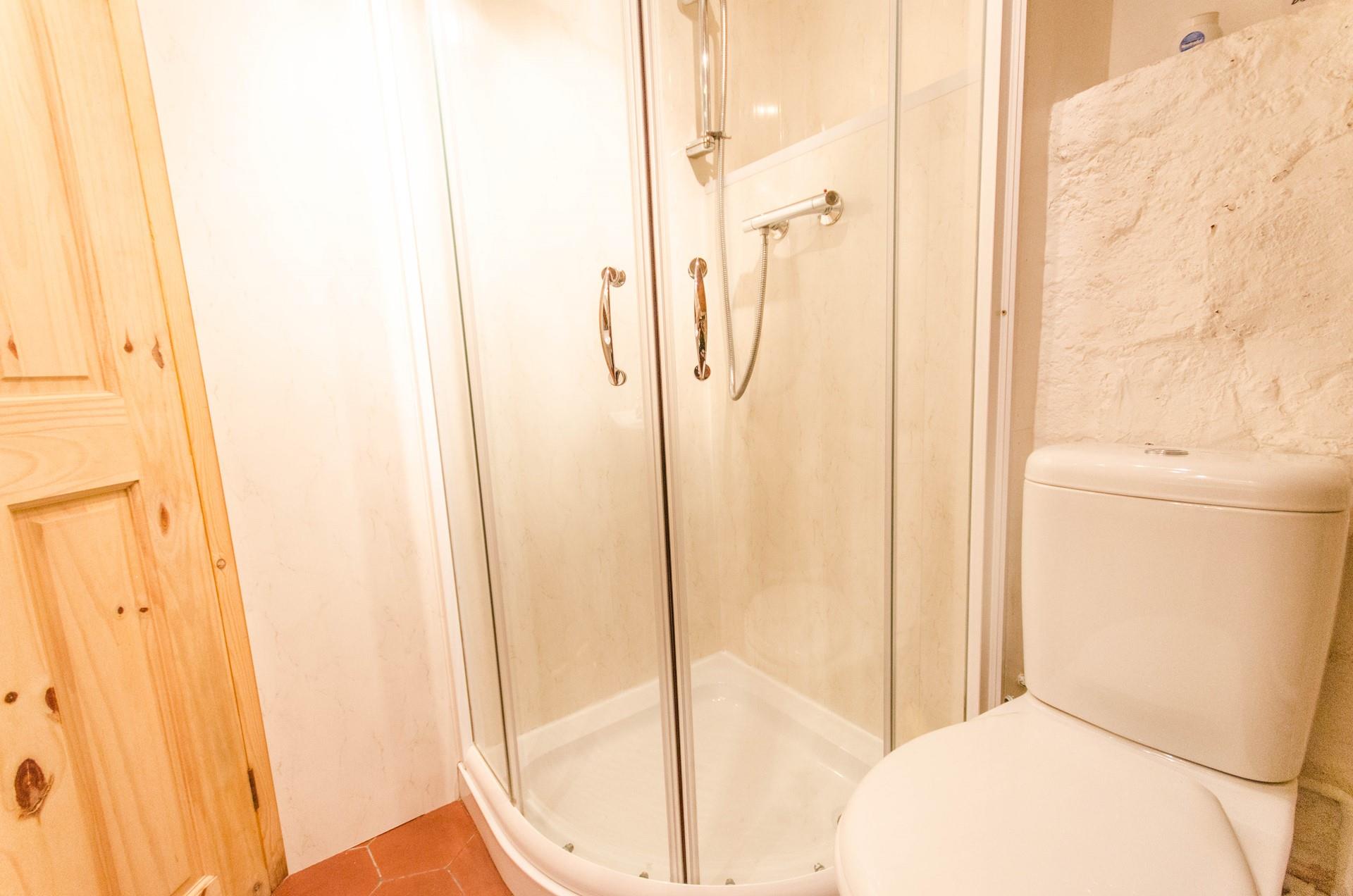 Ground floor shower room with WC.