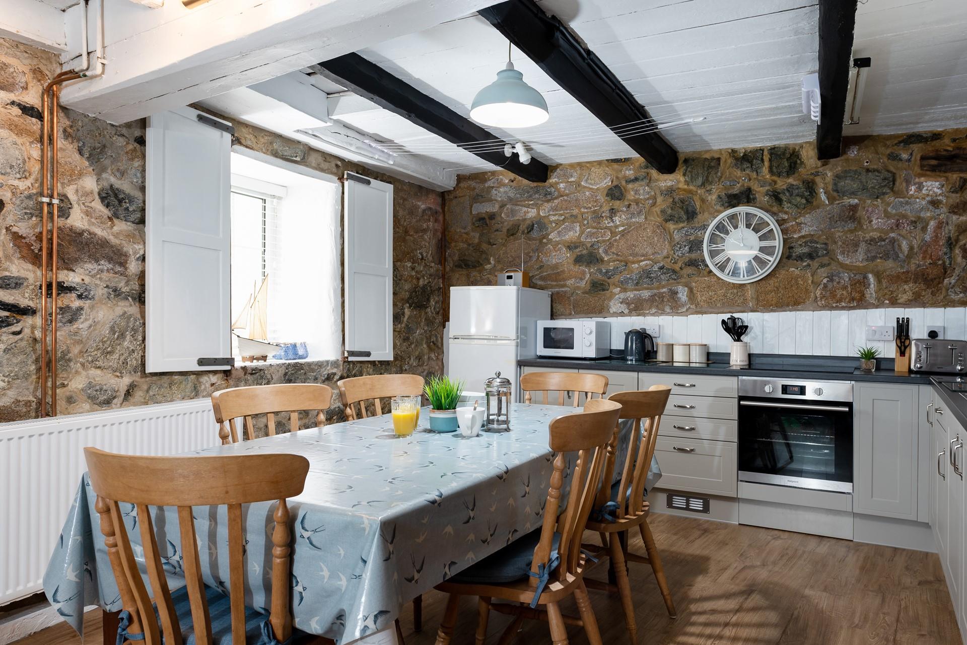 The well-equipped kitchen is perfect for cooking up a storm using local produce.