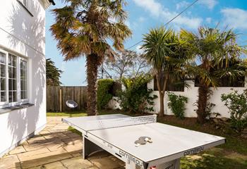 Enjoy a game of table tennis in the last of the evening sunshine. 