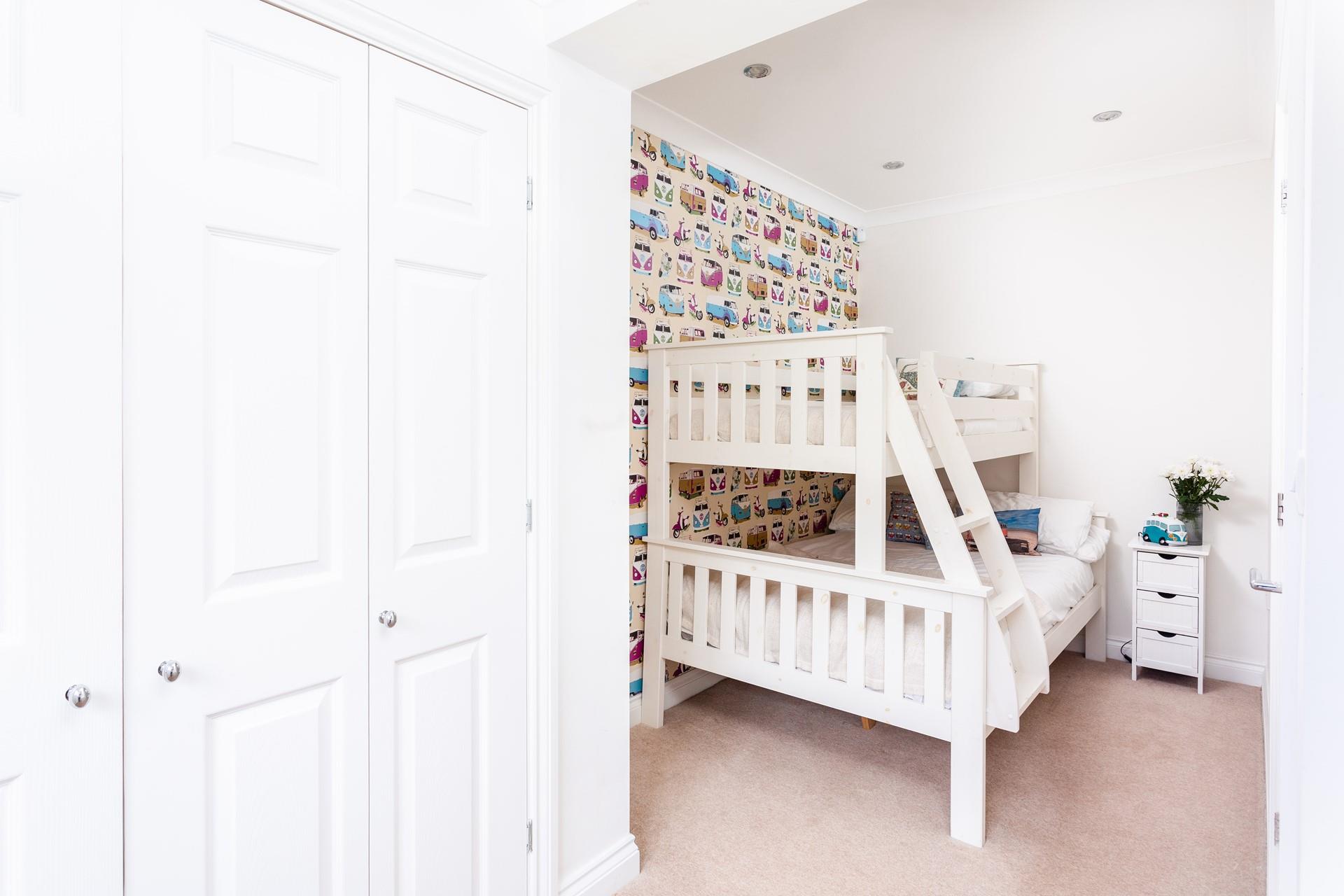 Children will love sharing this fun room.