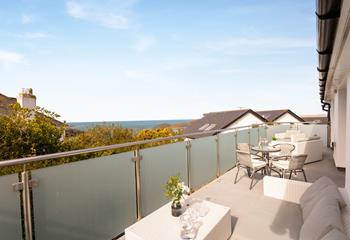 Live the luxurious lifestyle and relax on the private balcony overlooking Carbis Bay. 