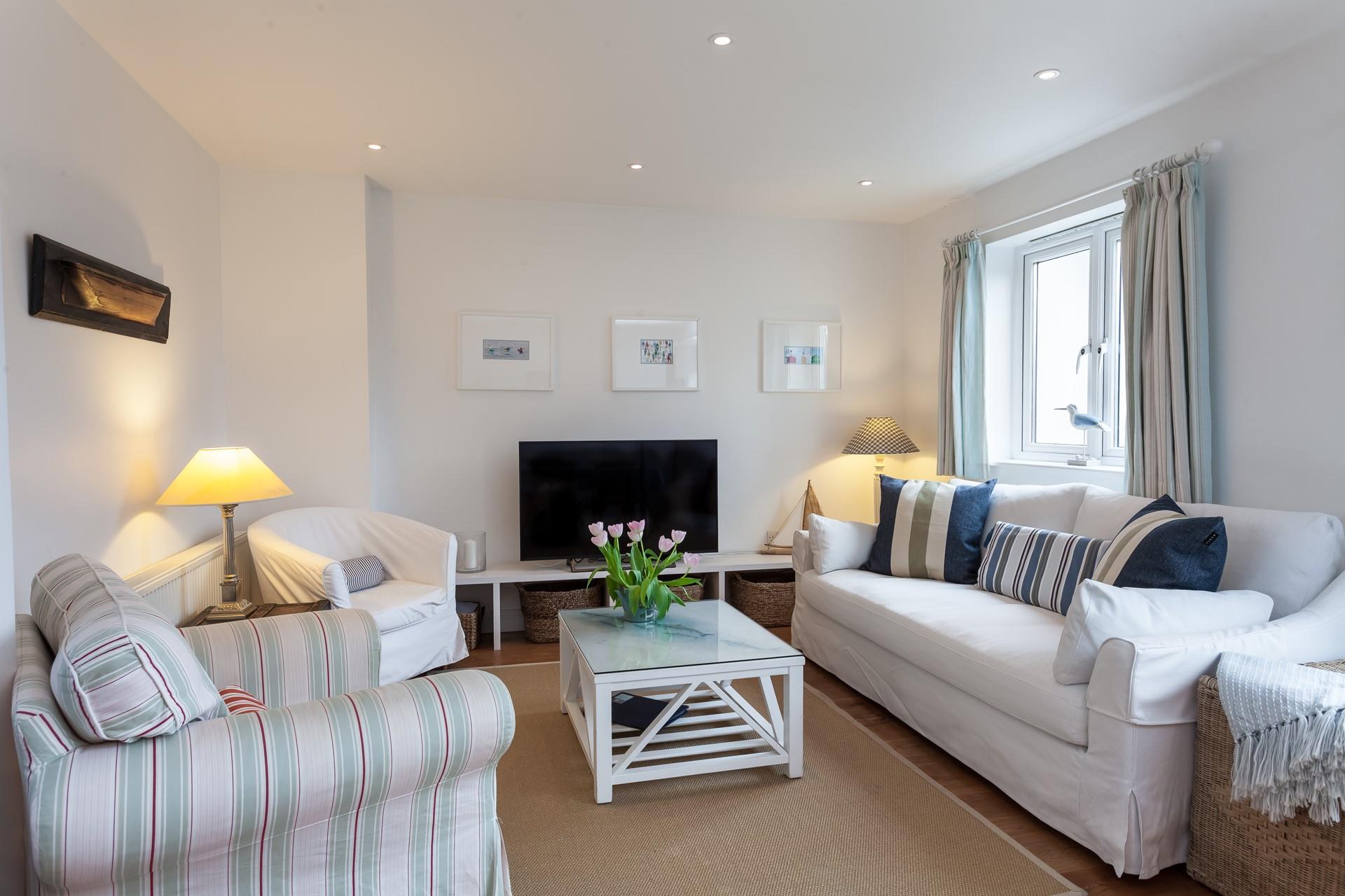 Relax in the spacious sitting room. 