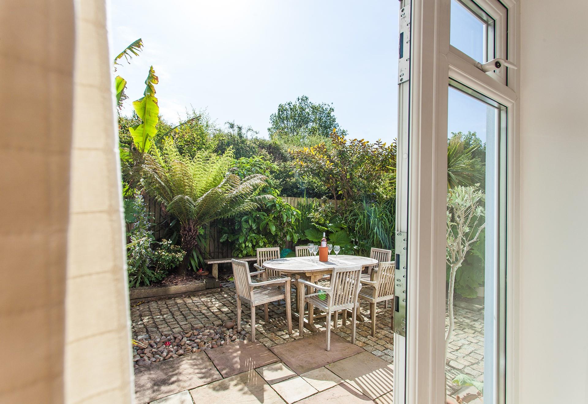 Enjoy long lazy lunches in the leafy garden.