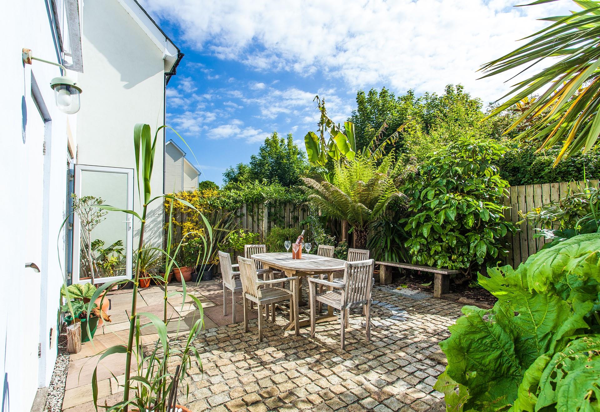 The rear patio area is perfect for dining al fresco.