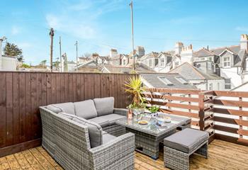 Enjoy a cold G and T on the outside decked terrace area.