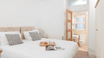 Bedroom 2 has zip and link beds and an en suite, which provides a relaxing space for kids or adults.