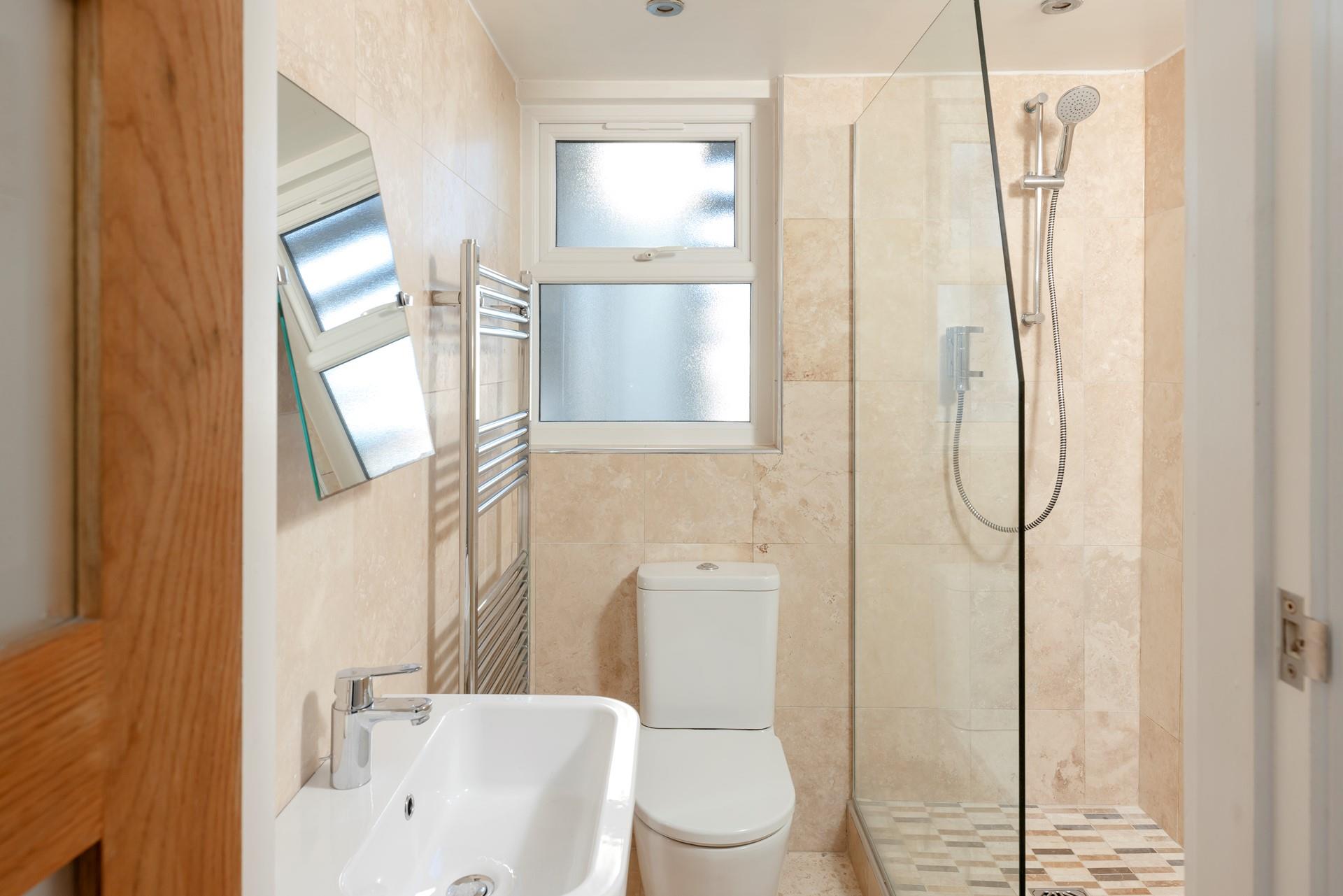 Wash off sandy toes in the shower after a day on the sand.