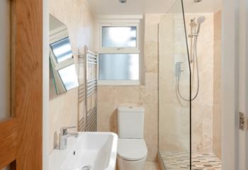 Wash off sandy toes in the shower after a day on the sand.