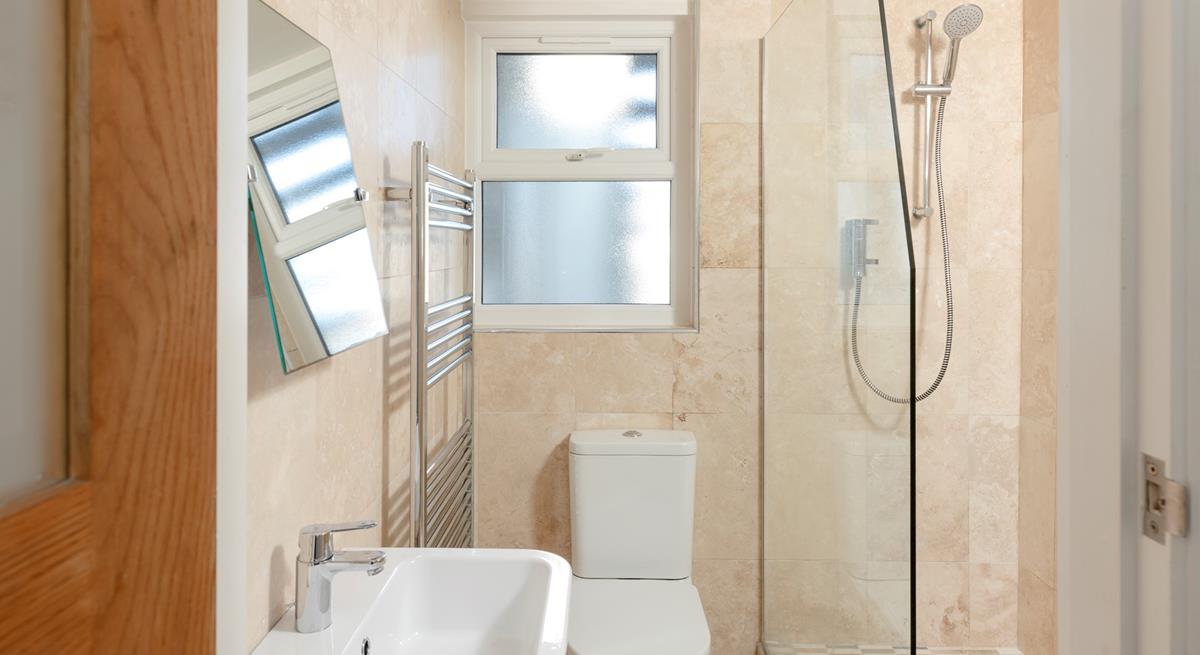 Wash off sandy toes in the shower after a day on the sand.