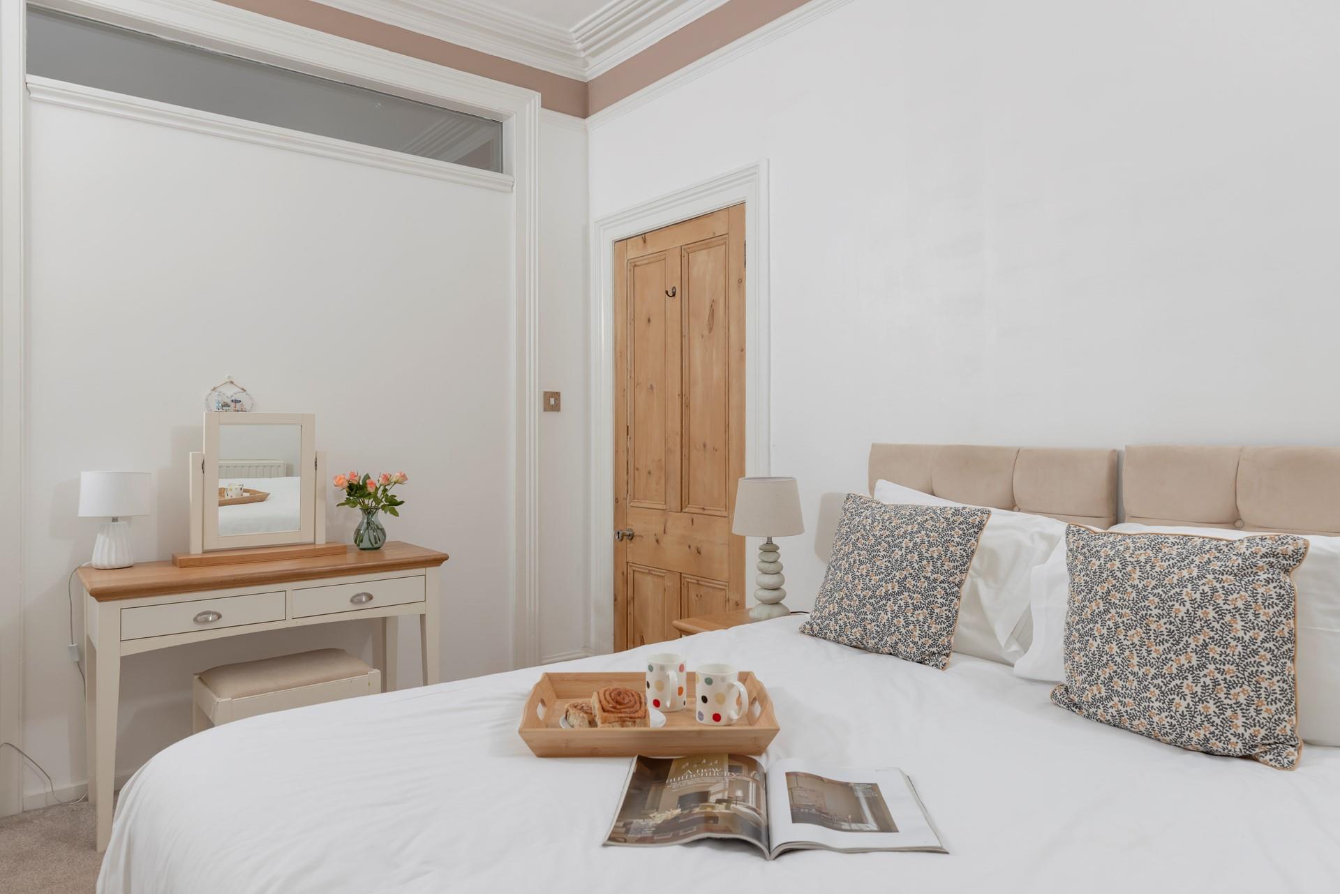 Get ready for the day at the dressing table.