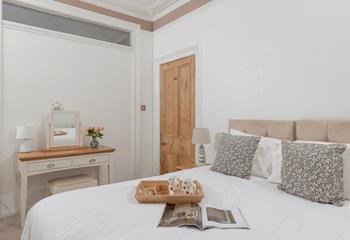 Get ready for the day at the dressing table.