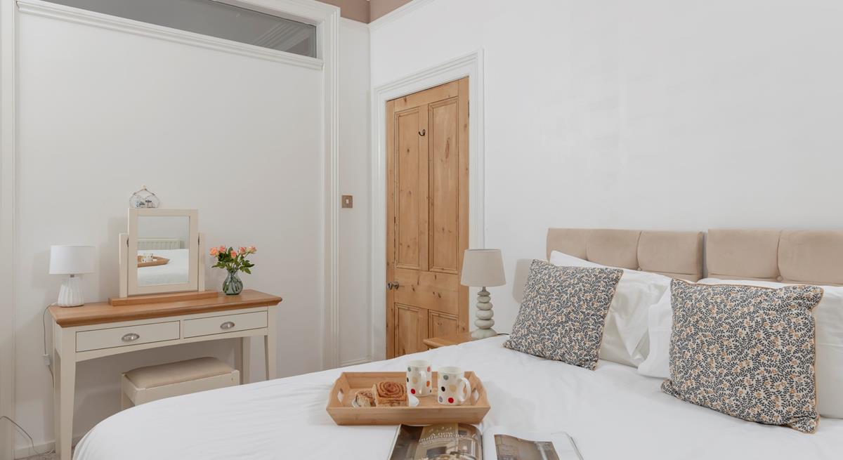 Get ready for the day at the dressing table.