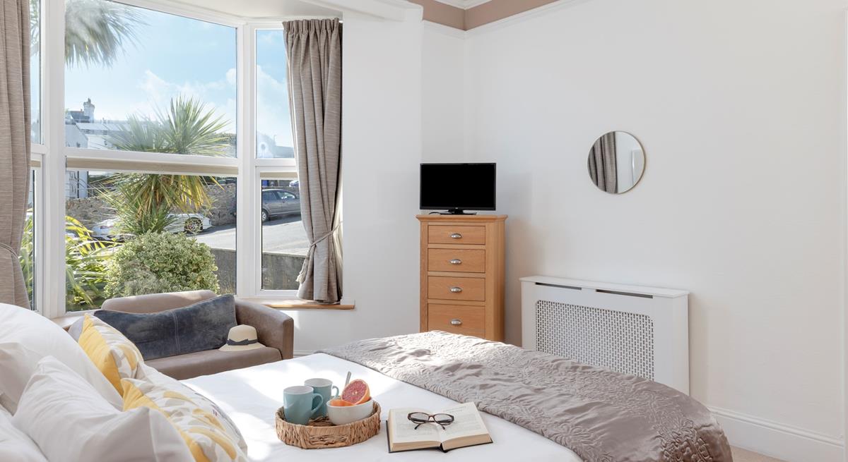 Bedroom 1 is on the ground floor and is filled with homely touches.