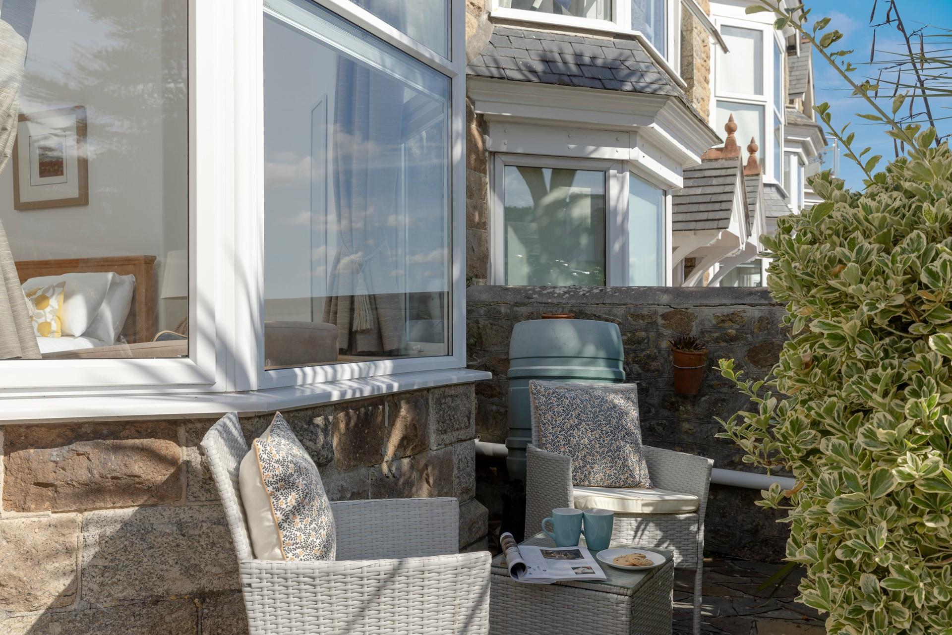 The front terrace has an additional seating area.