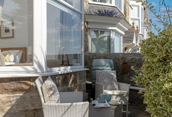 The front terrace has an additional seating area.