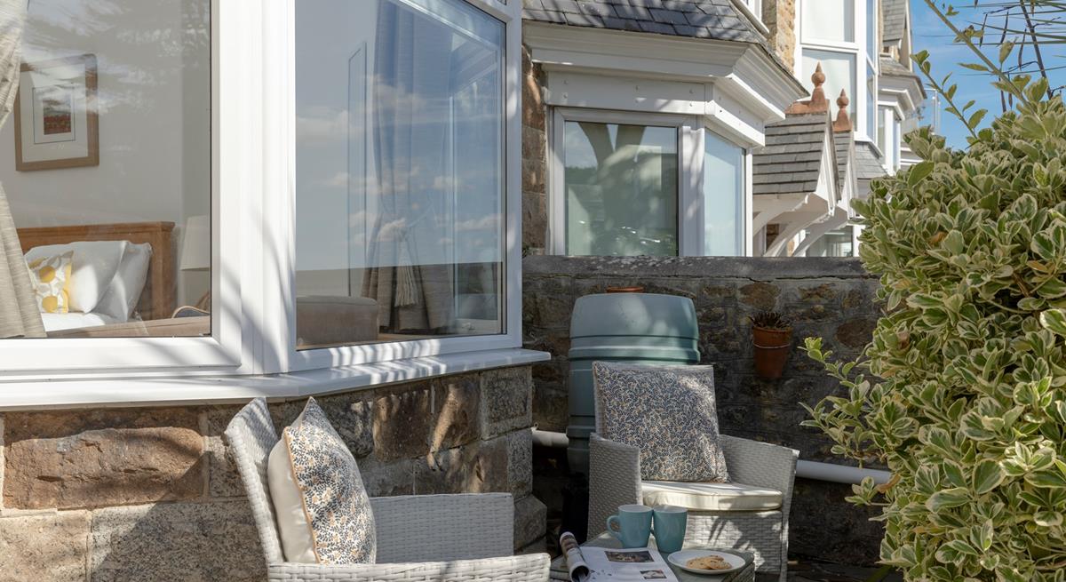 The front terrace has an additional seating area.