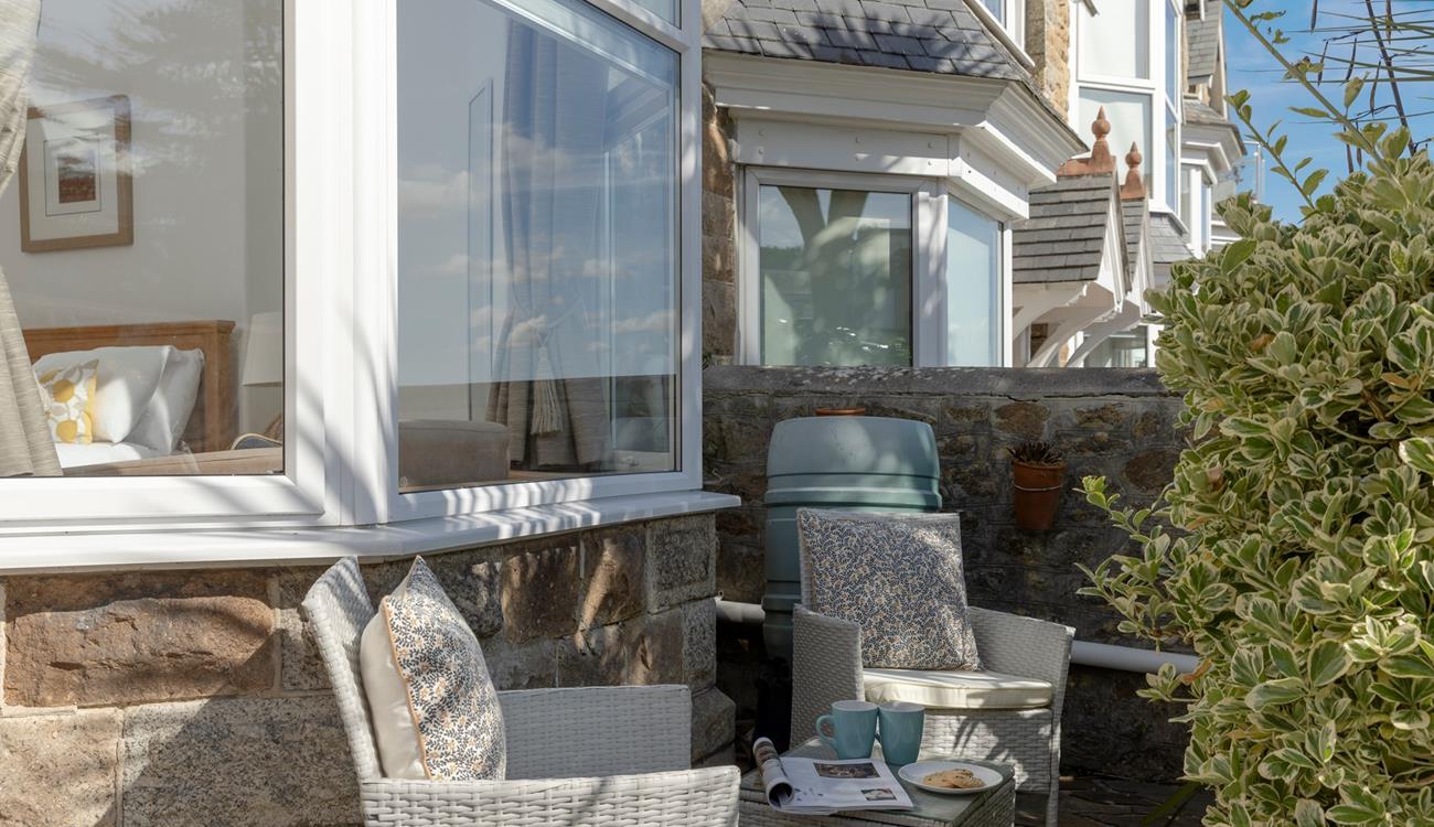 The front terrace has an additional seating area.