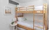 Bedroom 3 has bunk beds, the kids will love having a sleepover each night. - Thumbnail Image