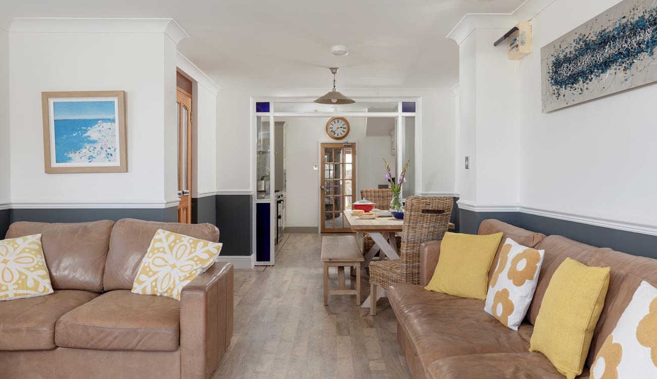 The spacious living area is the perfect base to return to after days of exploring.