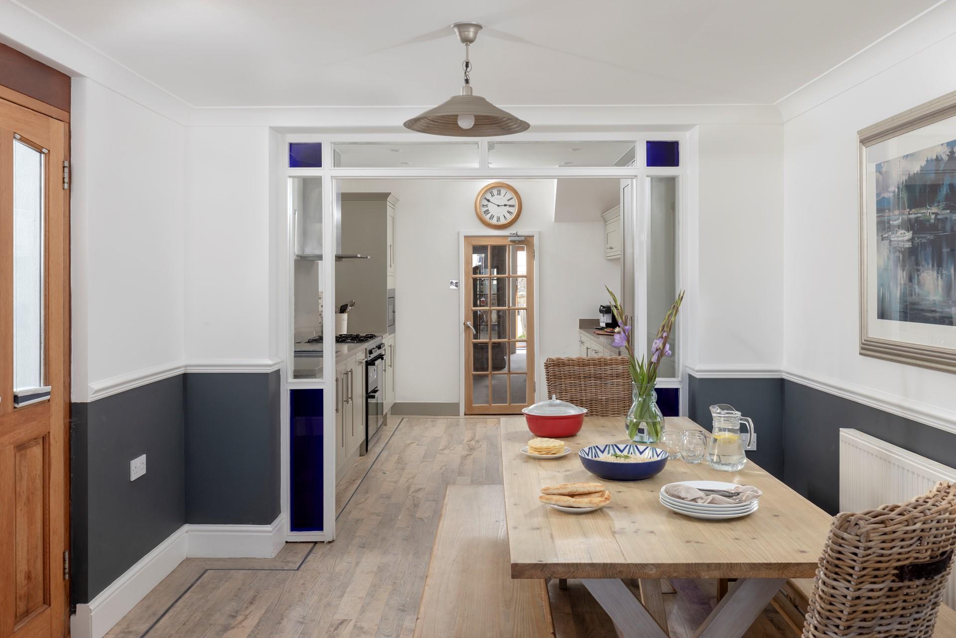 Tuck into a hearty meal around the dining table.