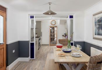 Tuck into a hearty meal around the dining table.